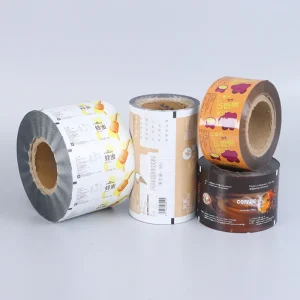 Custom printed food packaging roll labels with durable flexible film for snacks and cookies.